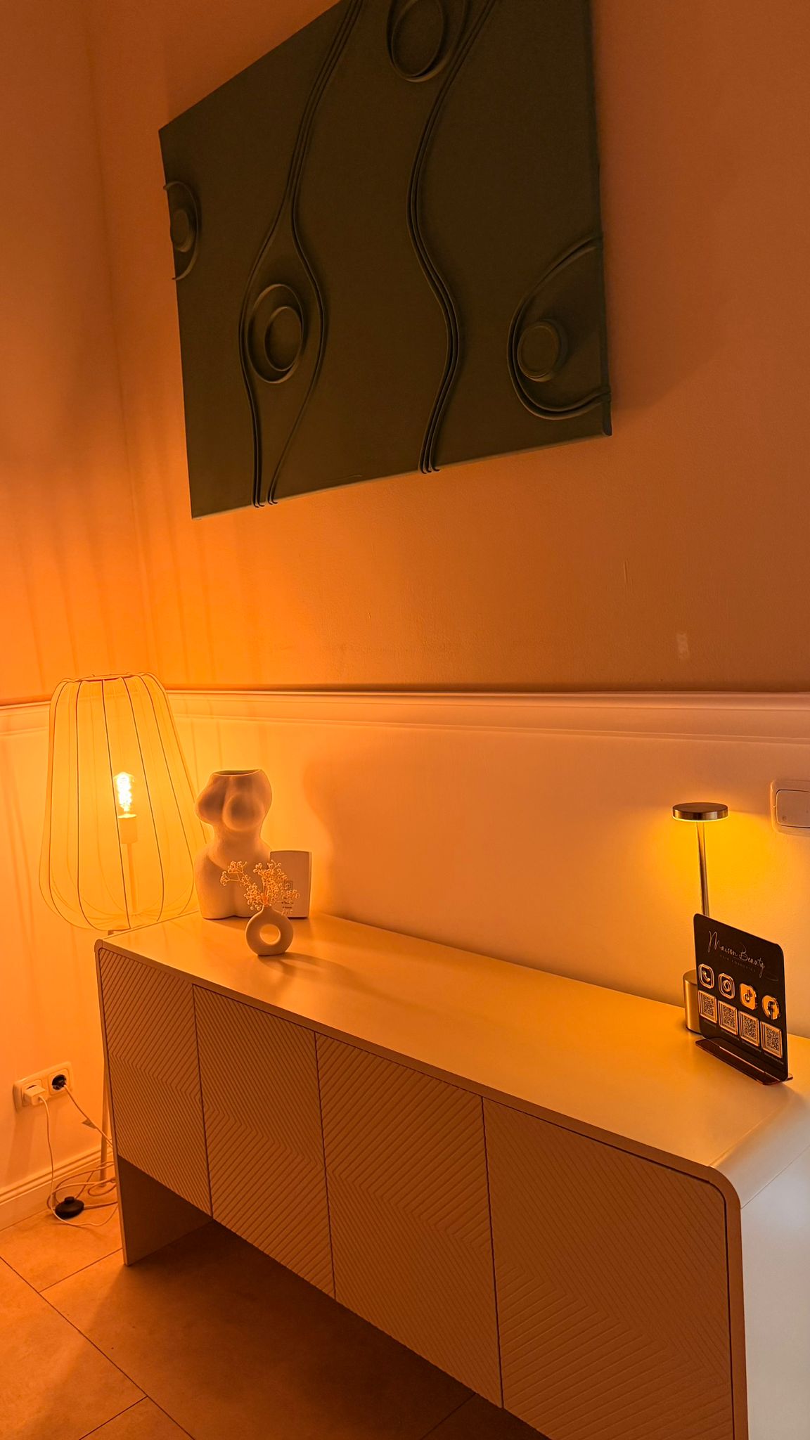 Manicure result with glossy red nails